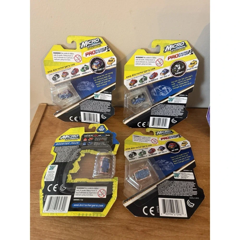 MICRO CHARGERS PRO RACING SYSTEM LAUNCHER PACK with 8 Micro Racing Cars